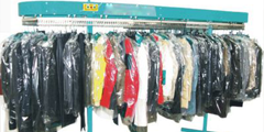 杭州干洗店使用衣物输送线作业